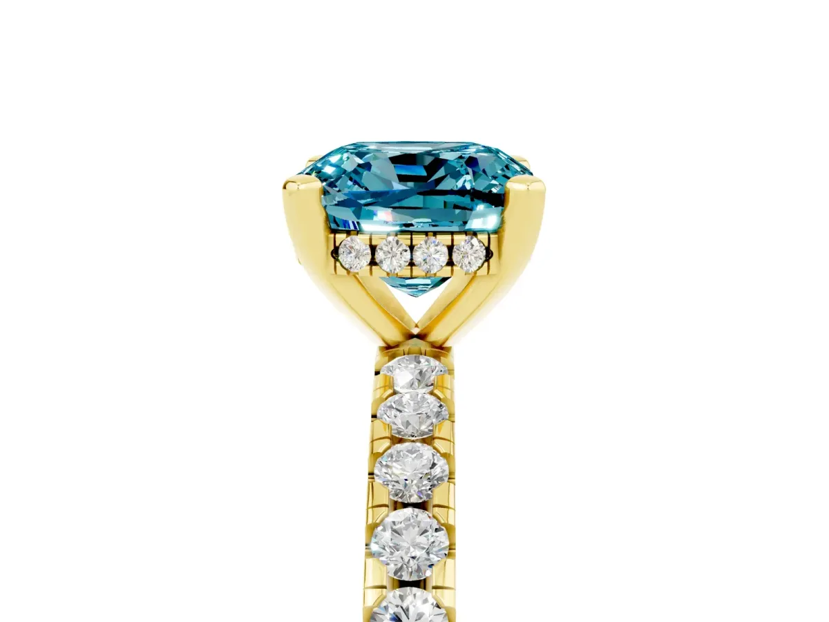 Cushion Cut Blue Topaz Solitaire Ring with Round Pavé Band and Four-Prong Setting Yellow gold