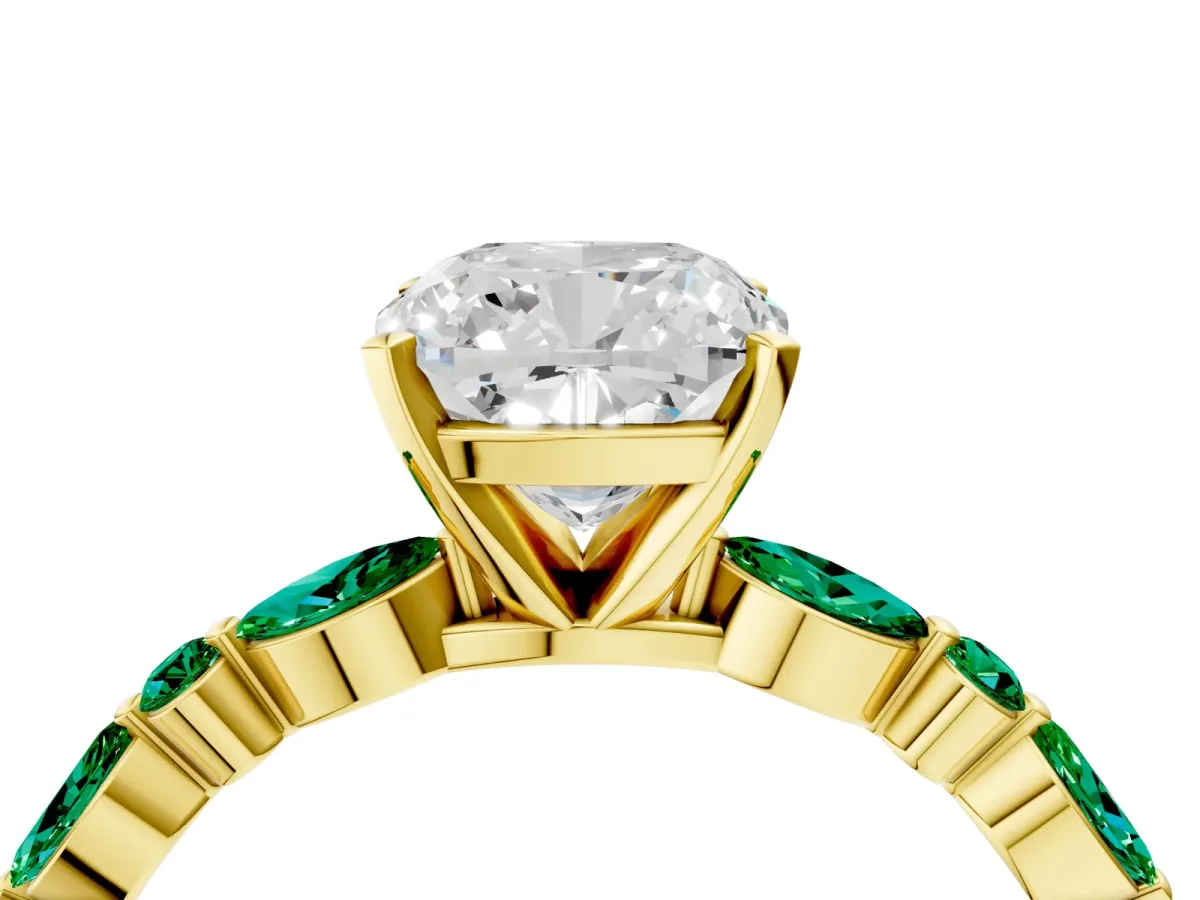 Cushion Cut Diamond Ring with Marquise and Round Emerald Side Stones and Four-Prong Setting Yellow gold