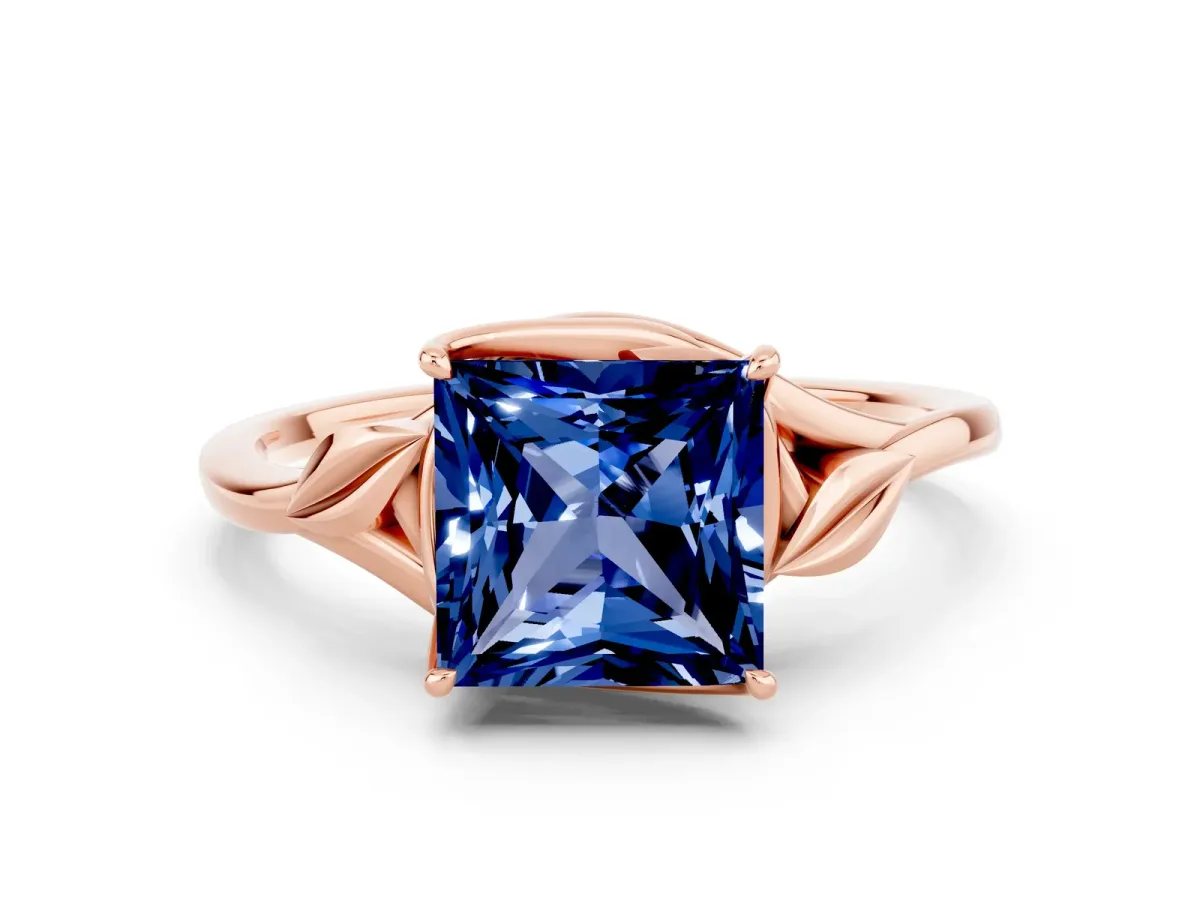 Princess Cut Blue Sapphire Solitaire Ring with Twist Band and Four-Prong Setting Rose gold