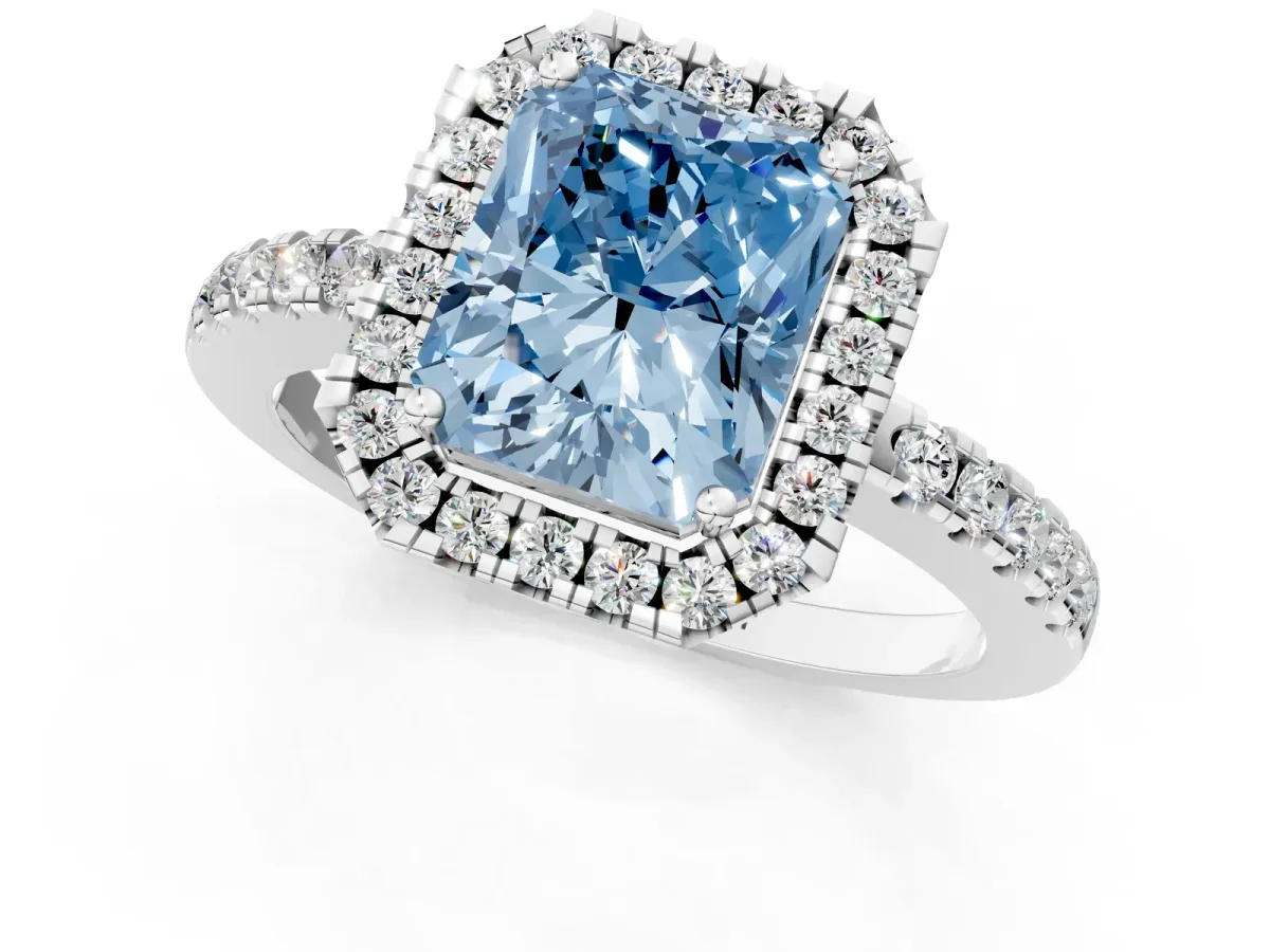 Fancy Blue Radiant Cut Halo Diamond Engagement Ring with Pavé Band and Four-Prong Setting Platinum