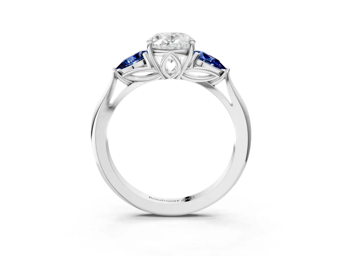 Oval Cut Diamond Three-Stone Ring with Pear Blue Sapphire Side Stones and Prong Setting Silver