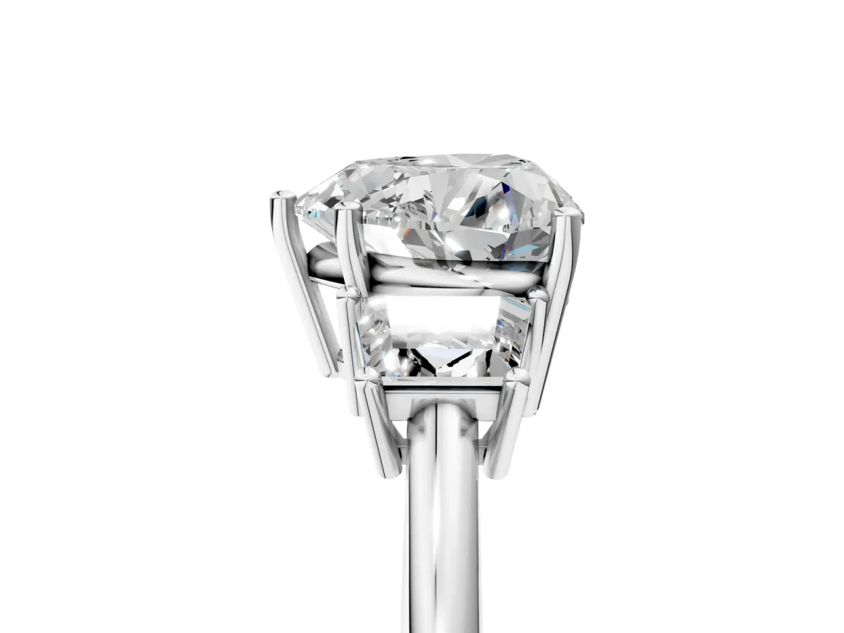 Heart Cut Diamond Three-Stone Ring with Trapezoid Side Stones and Prong Setting Silver