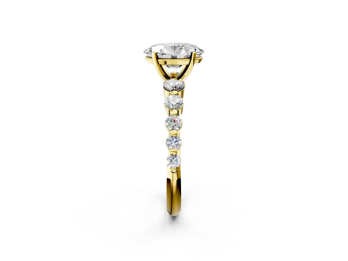 Oval Cut Solitaire Diamond Ring with Pave Band and Four-Prong Setting Yellow gold