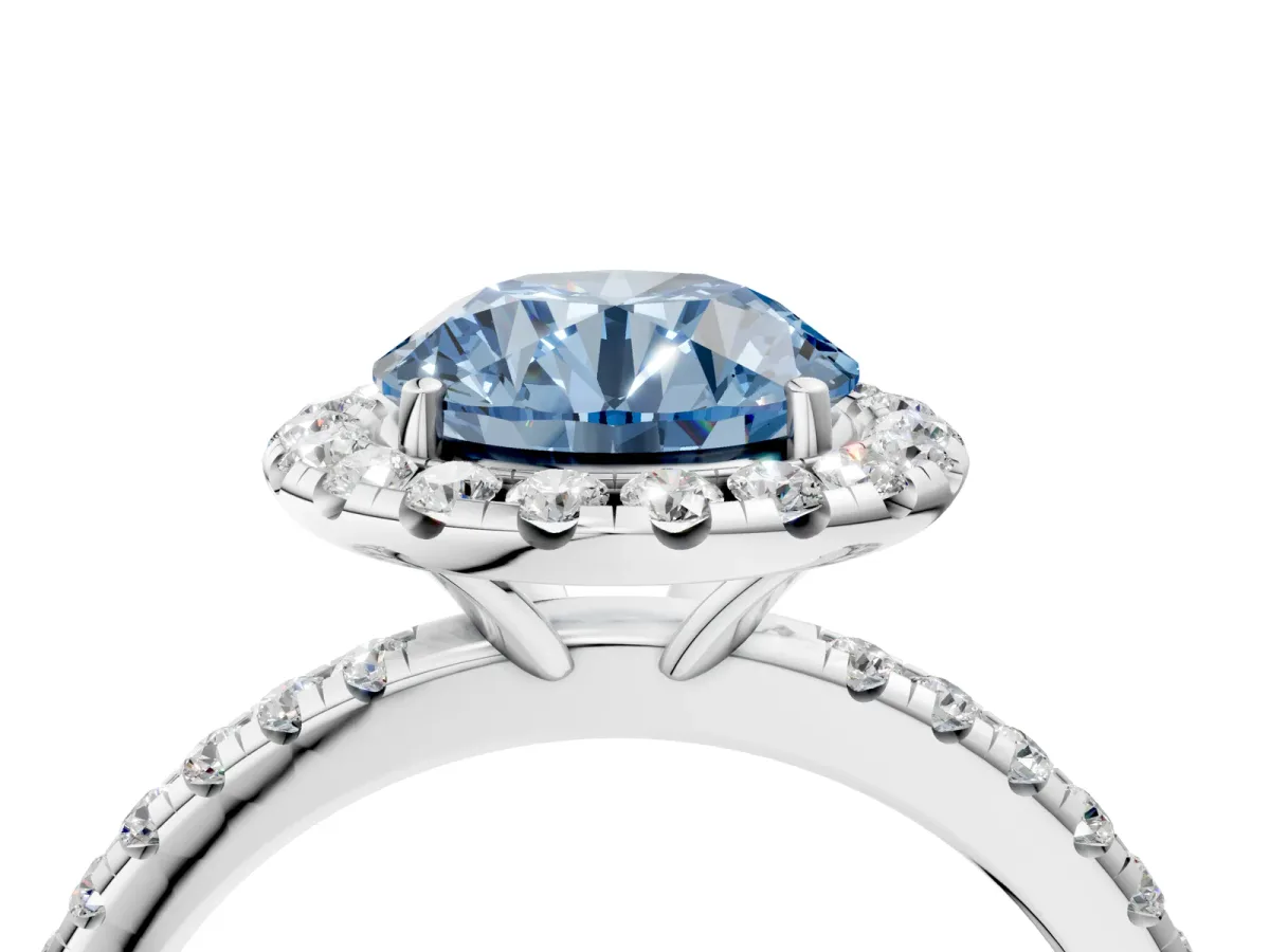 Fancy Blue Round Cut Diamond Halo Ring with Round Pavé Band and Prong Setting Platinum