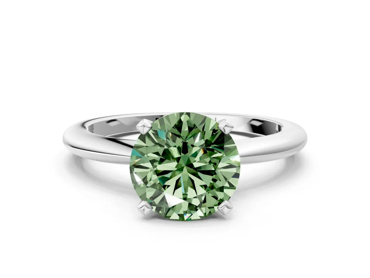 Fancy Green Round Cut Diamond Solitaire Ring with Six-Prong Setting and Classic Band Silver