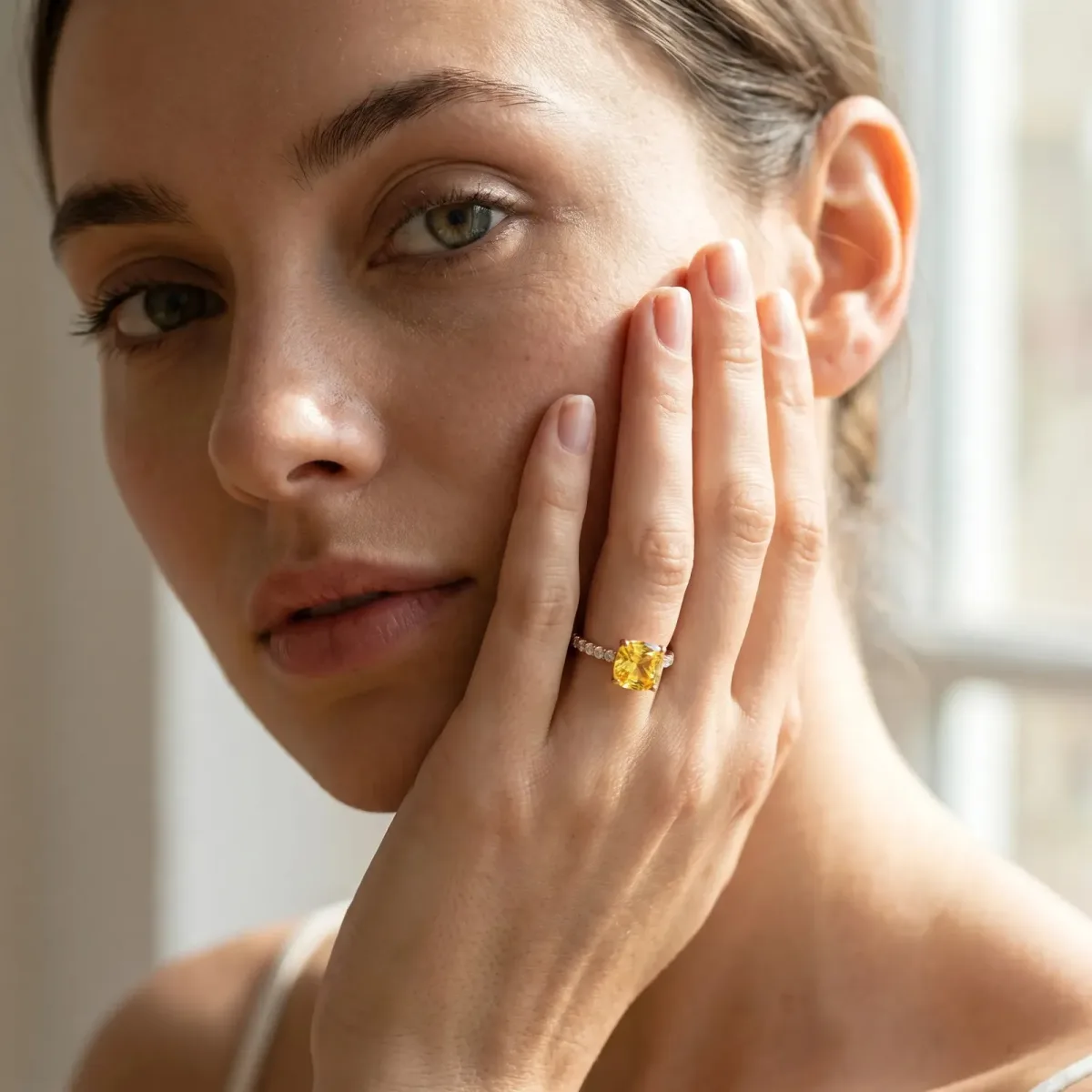 Cushion Cut Yellow Sapphire Solitaire Ring with Round Pavé Band and Four-Prong Setting Rose gold