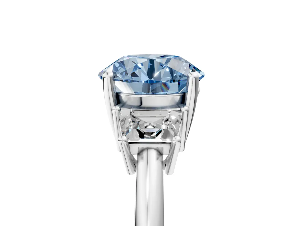 Fancy Blue Round Cut Diamond Three-Stone Ring with Trapezoid Side Stones and Prong Setting Platinum