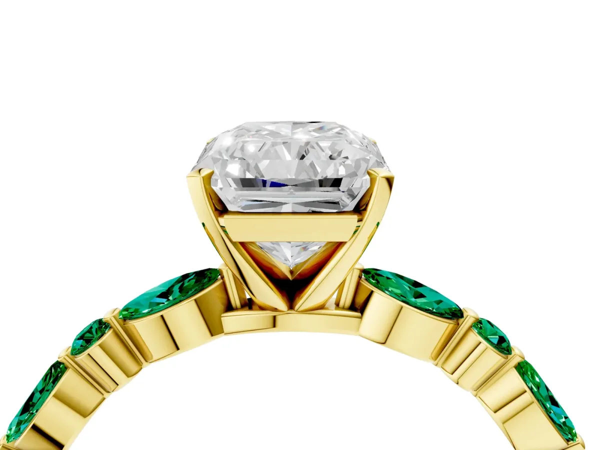 Radiant Cut Diamond Ring with Marquise and Round Emerald Side Stones and Four-Prong Setting Yellow gold