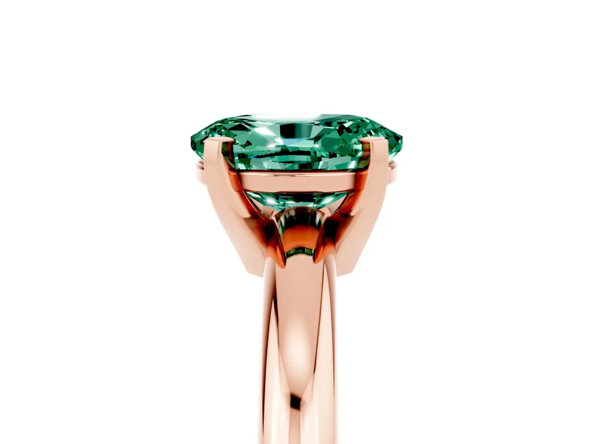 Oval Cut Green Sapphire Solitaire Engagement Ring with Round Band and Four-Prong Setting Rose gold