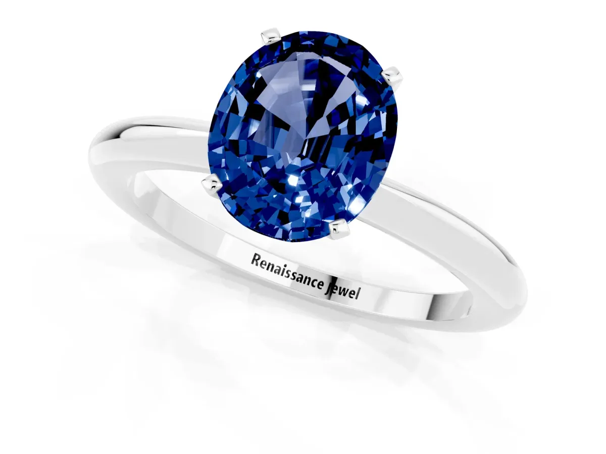 Oval Cut Blue Sapphire Solitaire Ring with Six-Prong Setting and Classic Band Silver