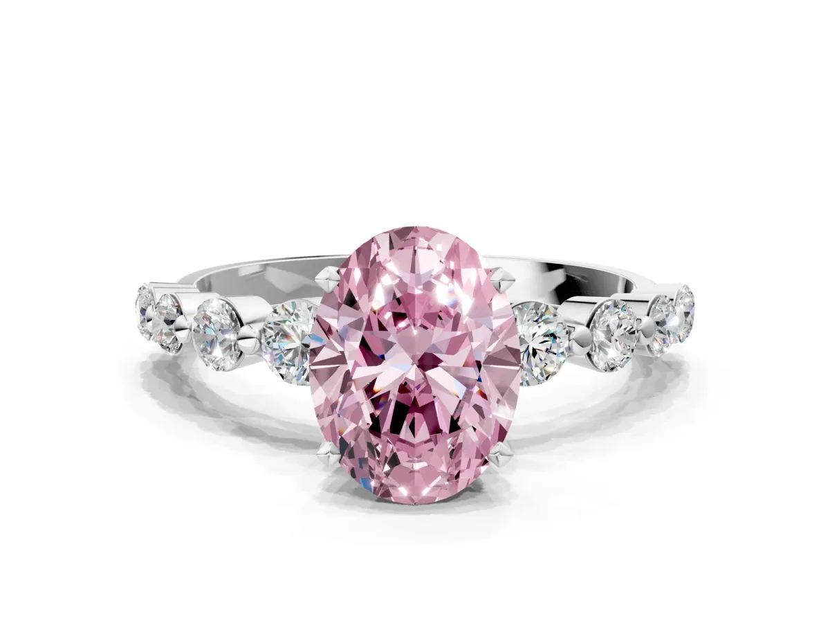 Fancy Pink Oval Cut Solitaire Diamond Ring with Pave Band and Four-Prong Setting Silver