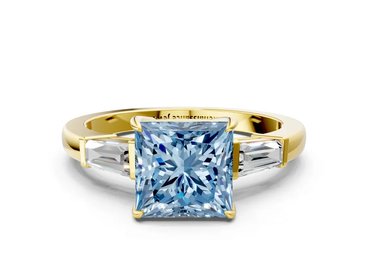 Fancy Blue Princess Cut Diamond Three-Stone Ring with Tapered Baguette Side Stones and Prong Setting Yellow gold