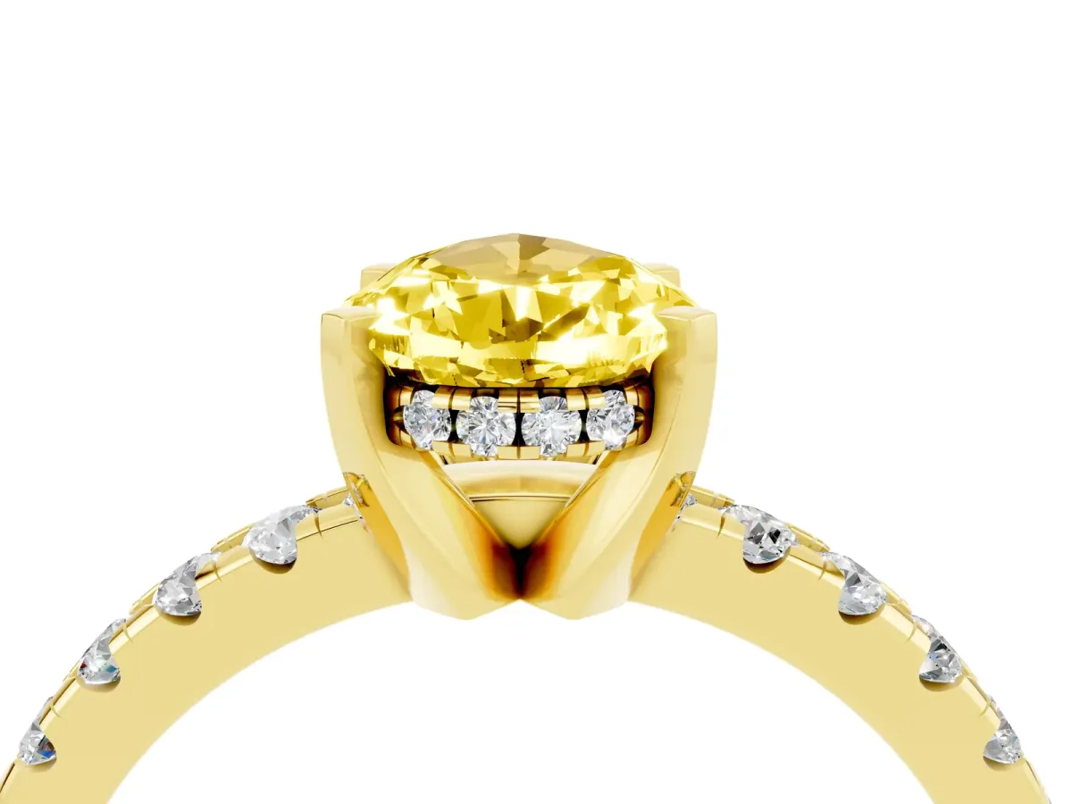 Pear Cut Yellow Sapphire Solitaire Ring with Round Pavé Band and Four-Prong Setting Yellow gold