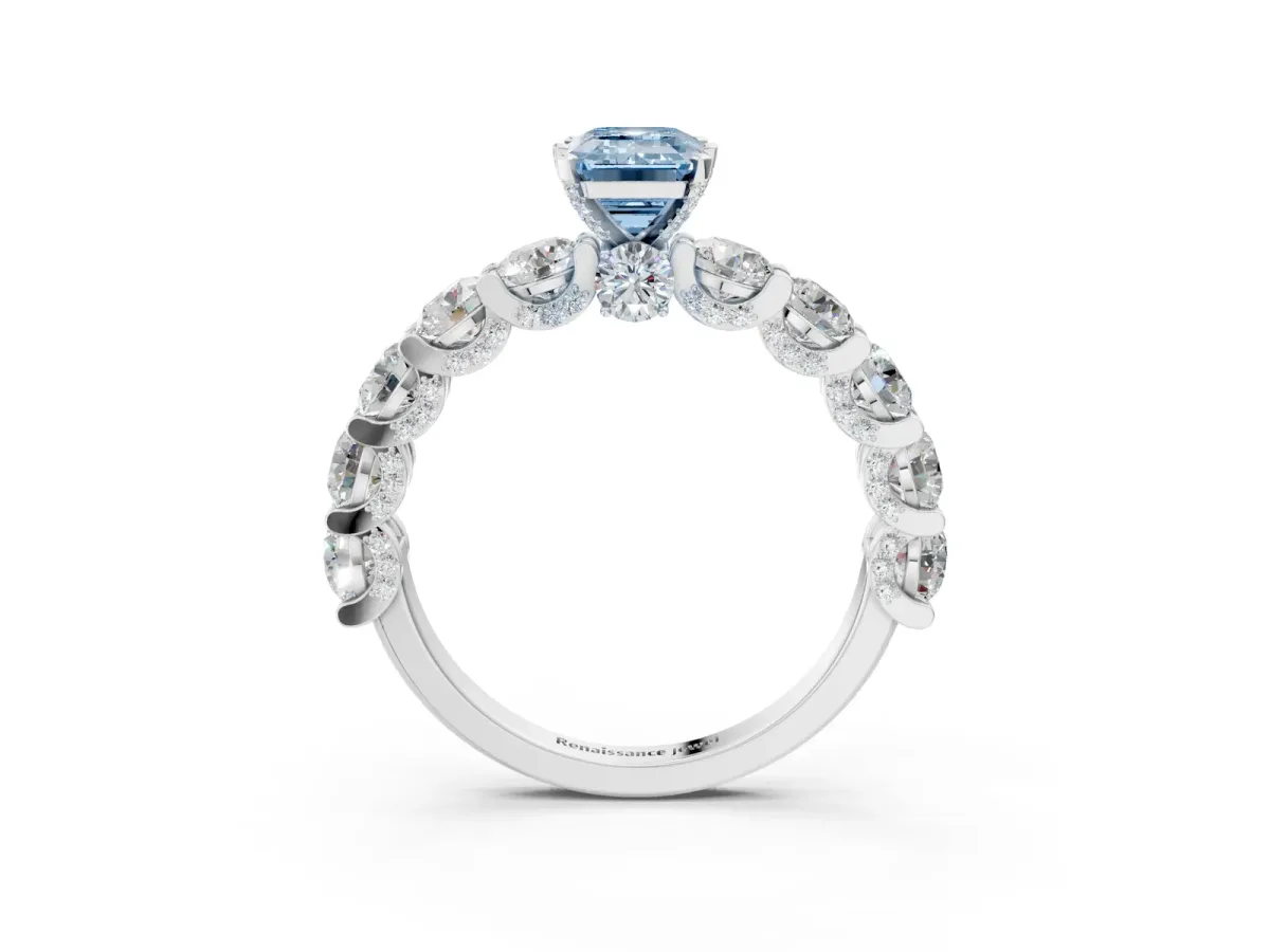 Fancy Blue Emerald Cut Diamond Side Stone Engagement Ring with Four-Prong Setting White gold