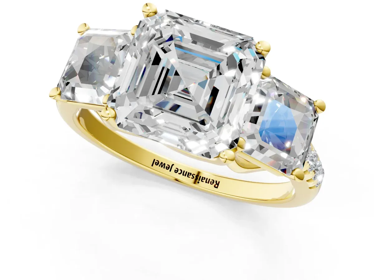 Three-Stone Asscher Cut Diamond Ring with Round Pavé Band and Prong Setting Yellow gold
