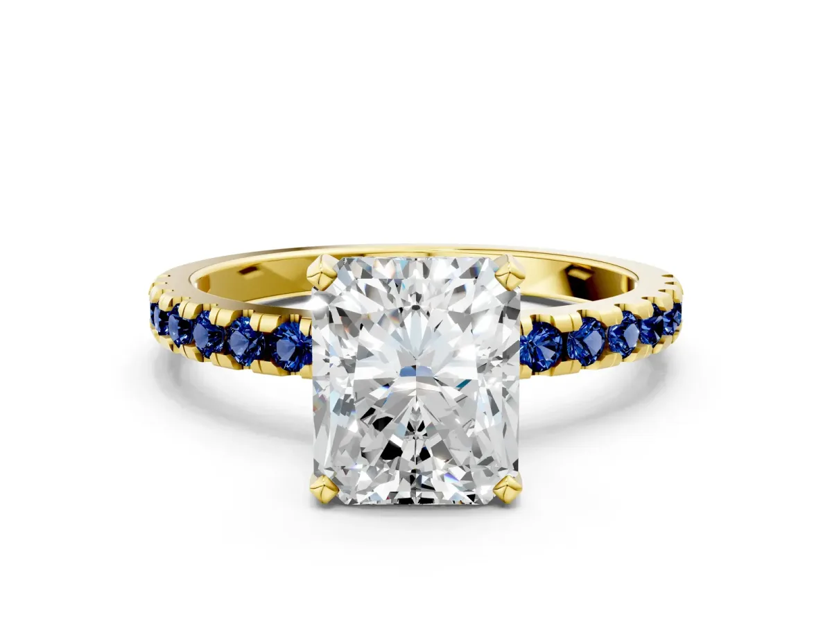 Radiant Cut Diamond Solitaire Ring with Round Blue Sapphire Pavé Band and Four-Prong Setting Yellow gold