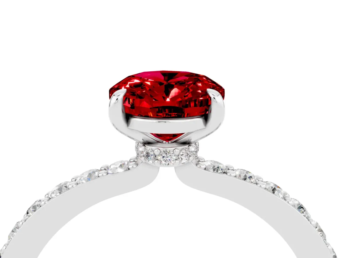 Oval Cut Ruby Solitaire Engagement Ring with Pavé Band and Four-Prong Setting White gold