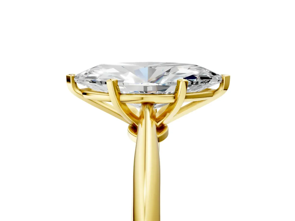 Marquise Cut Diamond Solitaire Engagement Ring with Classic Band and Four-Prong Setting Yellow gold