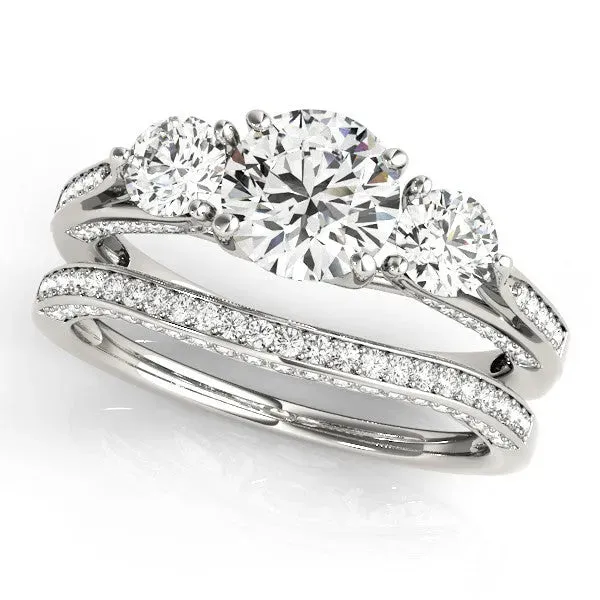 Round Cut Brilliant Three-Stone Engagement Ring with Split Shank and Prong Setting Silver
