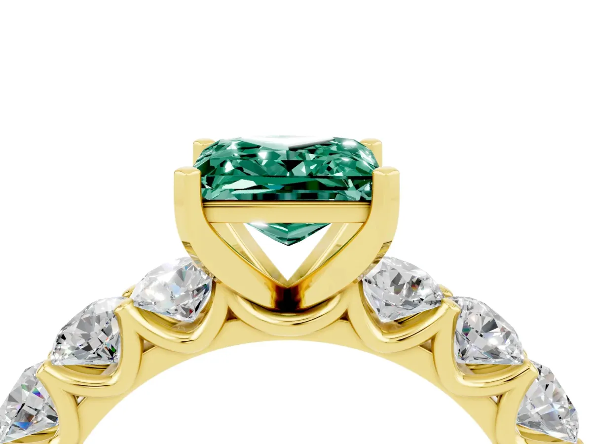 Princess Cut Green Sapphire Prong Setting with Side Stones on a Pave Band Yellow gold