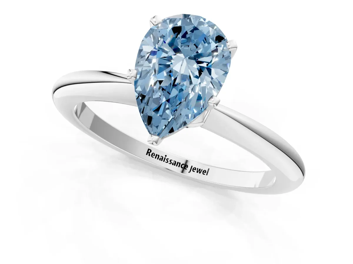 Fancy Blue Pear Cut Diamond Solitaire Ring with Six-Prong Setting and Classic Band Platinum