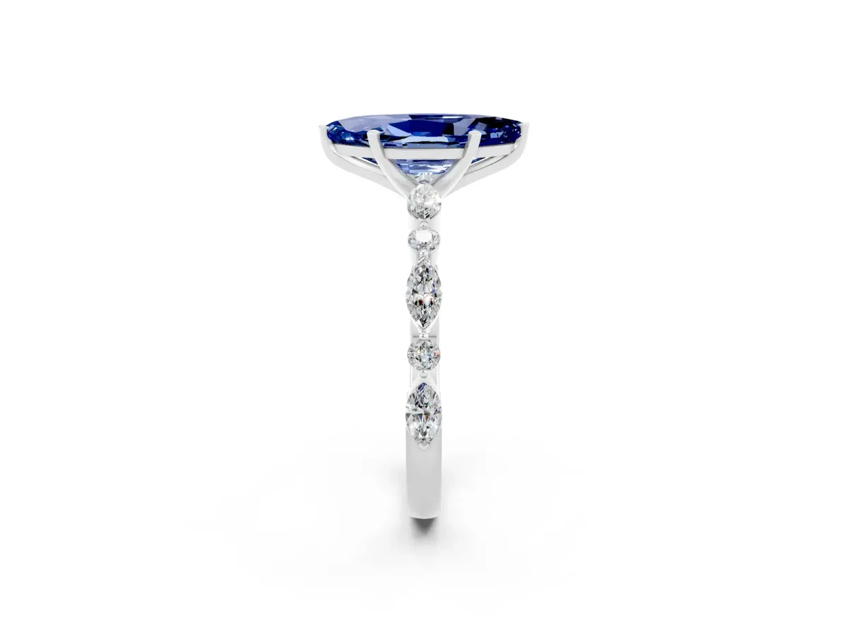 Marquise Cut Blue Sapphire Ring with Marquise and Round Side Stones and Four-Prong Setting White gold
