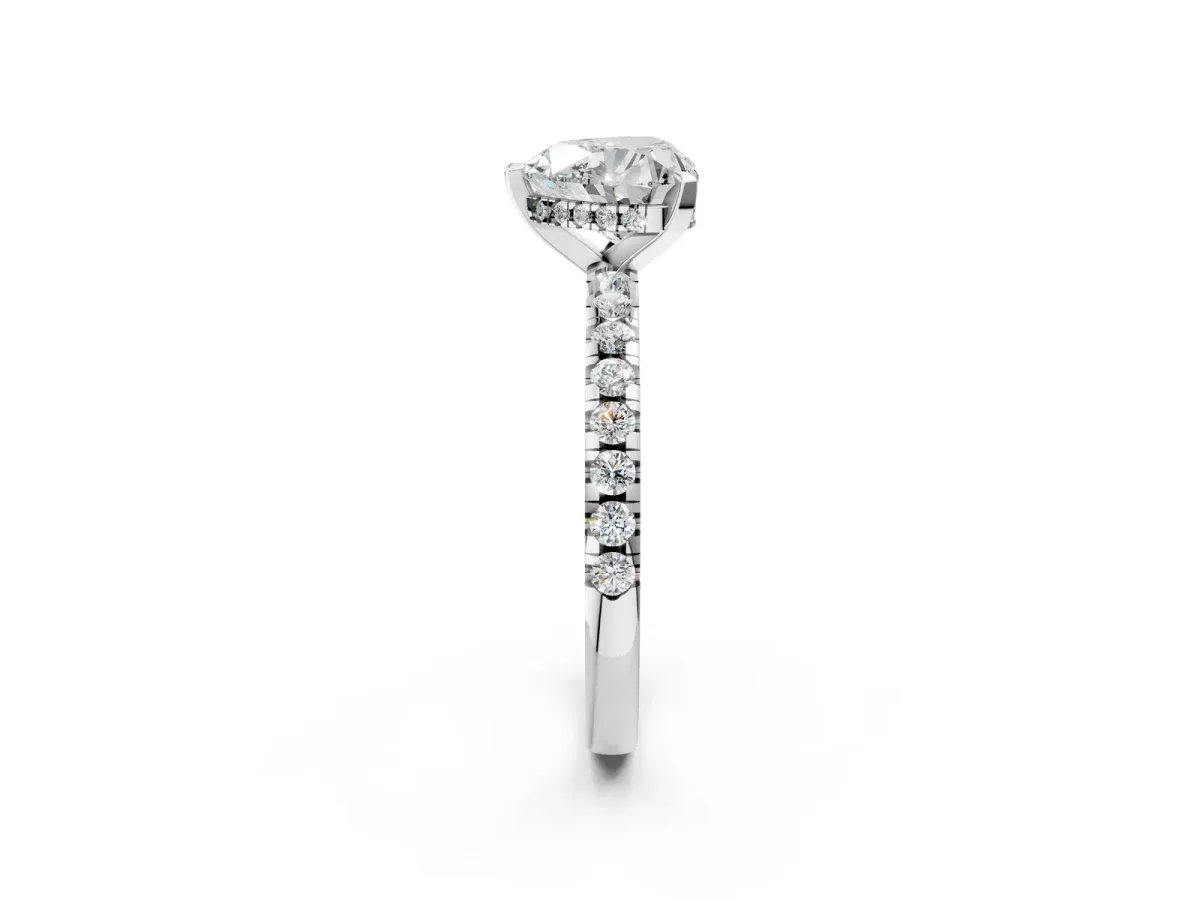 Heart Cut Diamond Solitaire Ring with Round Pavé Band and Four-Prong Setting Platinum