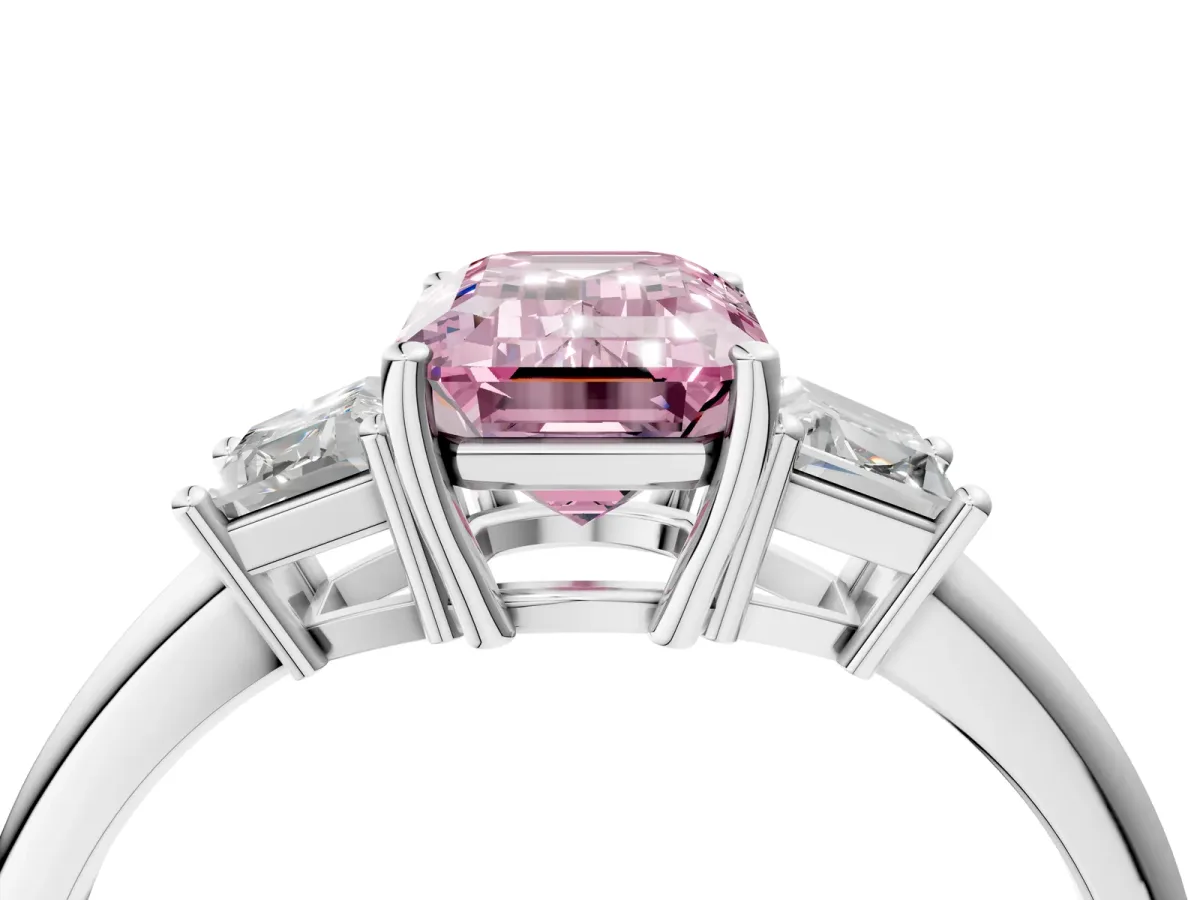 Fancy Pink Emerald Cut Diamond Three-Stone Ring with Trapezoid Side Stones and Prong Setting Platinum