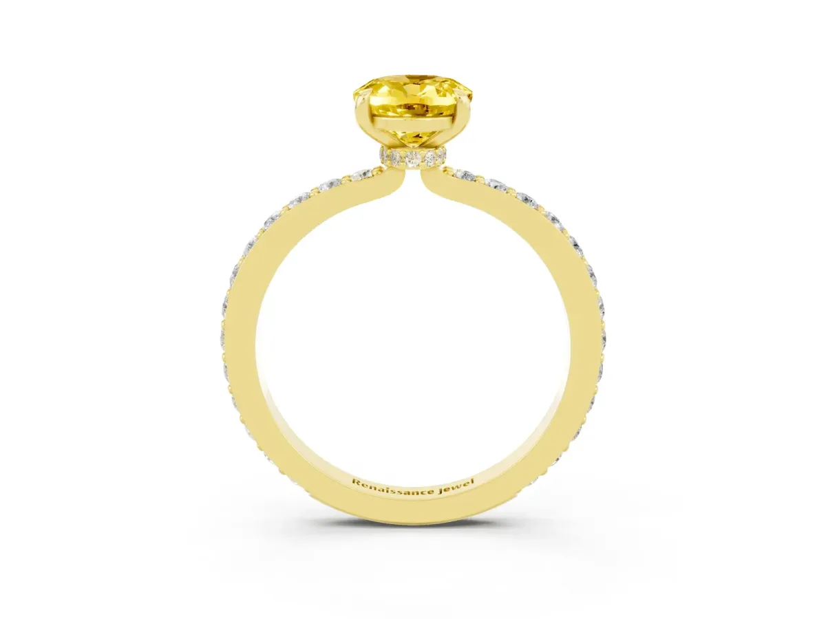 Oval Cut Yellow Sapphire Solitaire Engagement Ring with Pavé Band and Four-Prong Setting Yellow gold