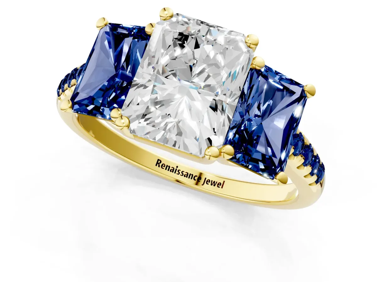 Three-Stone Radiant Cut Diamond Ring with Round Blue Sapphire Pavé Band and Prong Setting Yellow gold