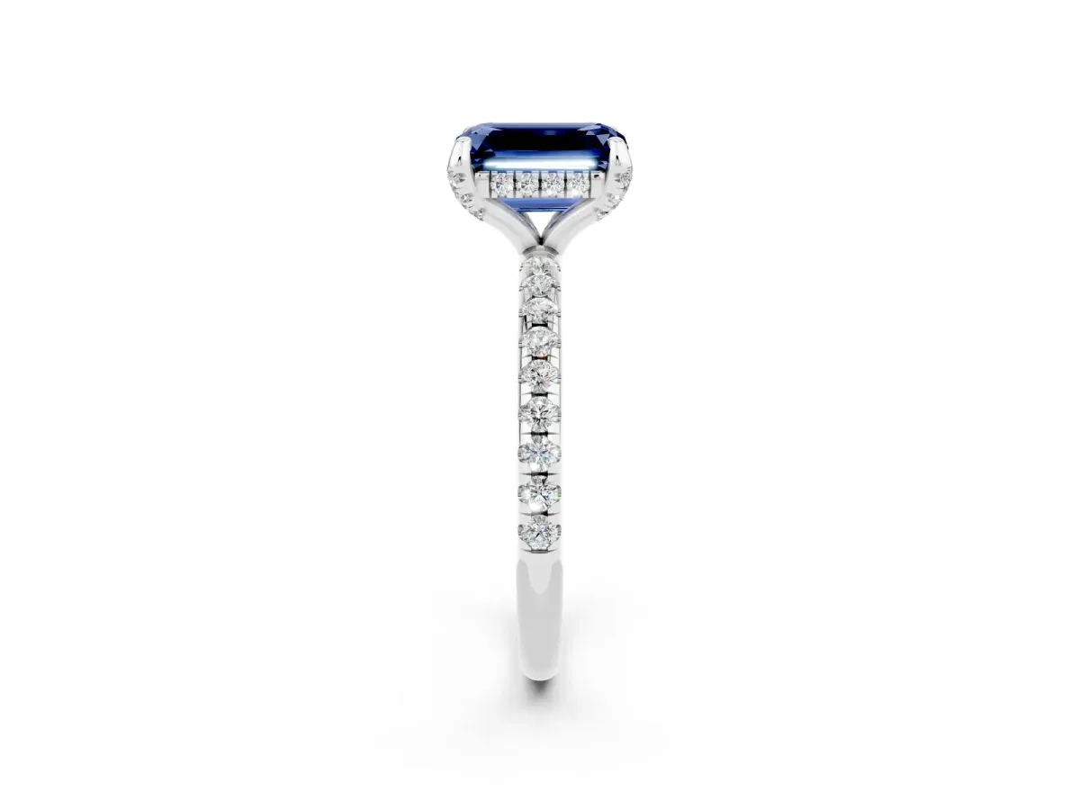 Emerald Cut Blue Sapphire Hidden Halo Engagement Ring with Round Pavé Band and Prong Setting Silver