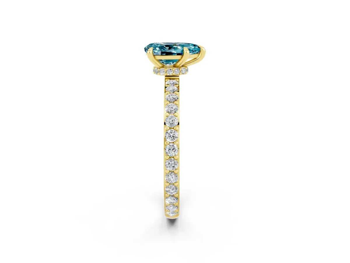 Pear Cut Blue Topaz Solitaire Engagement Ring with Pavé Band and Four-Prong Setting Yellow gold