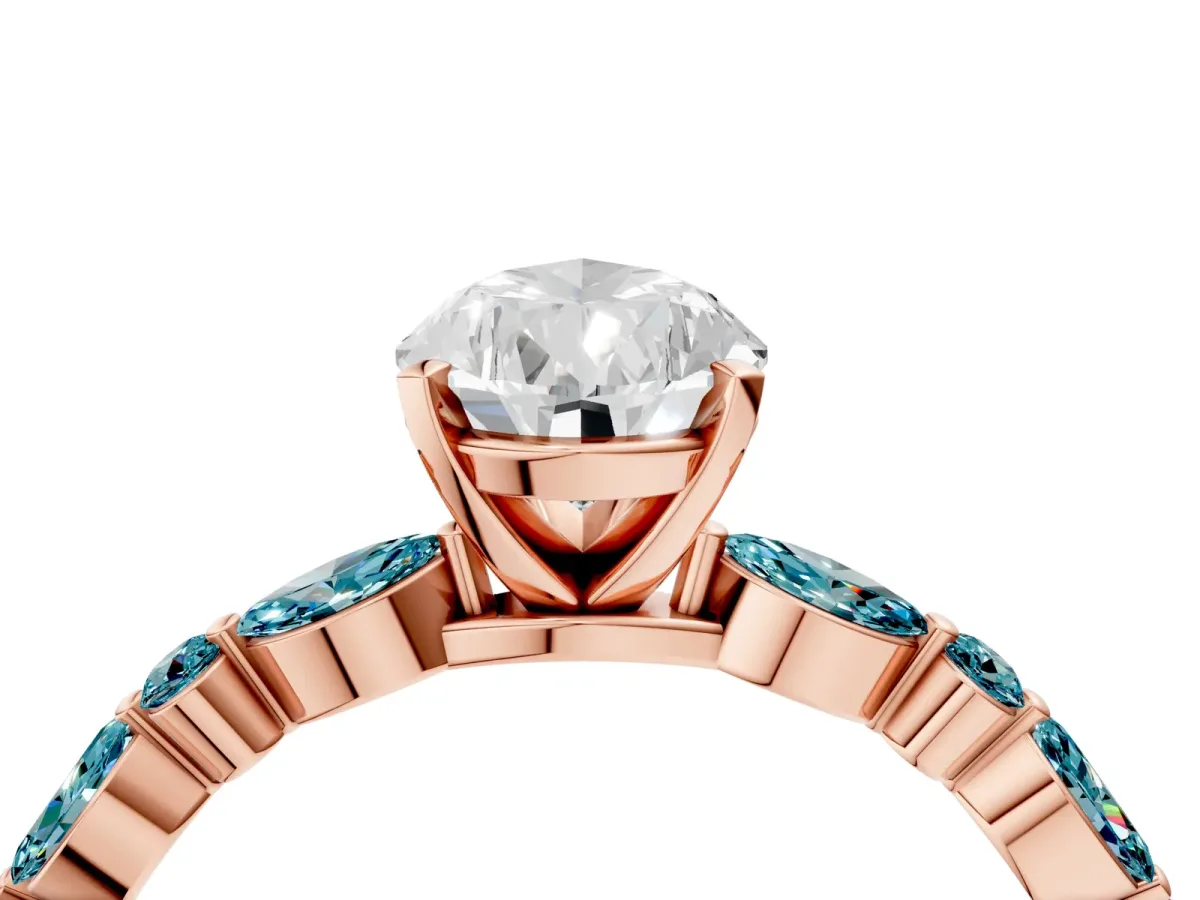 Pear Cut Diamond Ring with Marquise and Round Blue Topaz Side Stones and Four-Prong Setting Rose gold