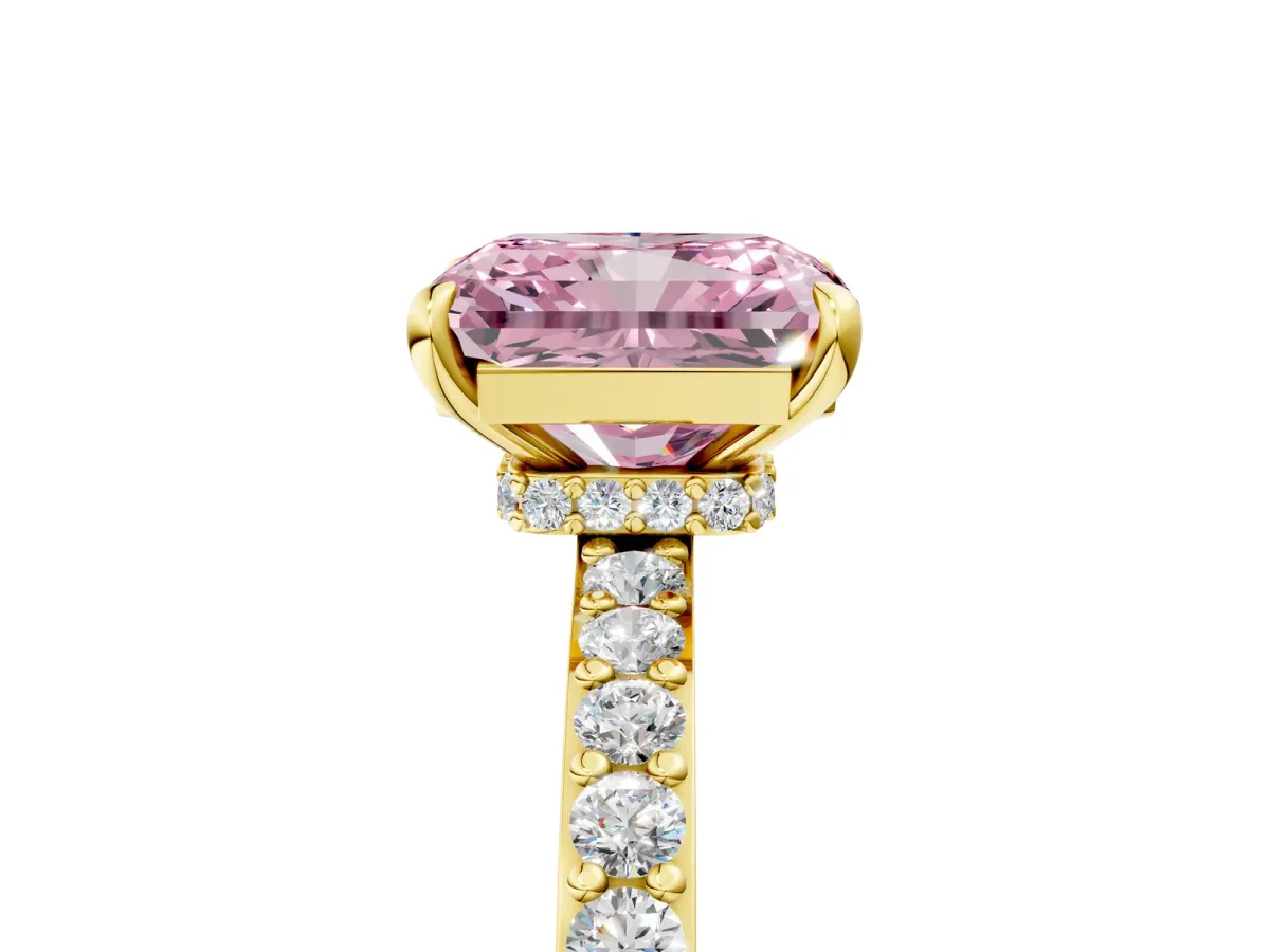Fancy Pink Radiant Cut Diamond Solitaire Engagement Ring with Pavé Band and Four-Prong Setting Yellow gold