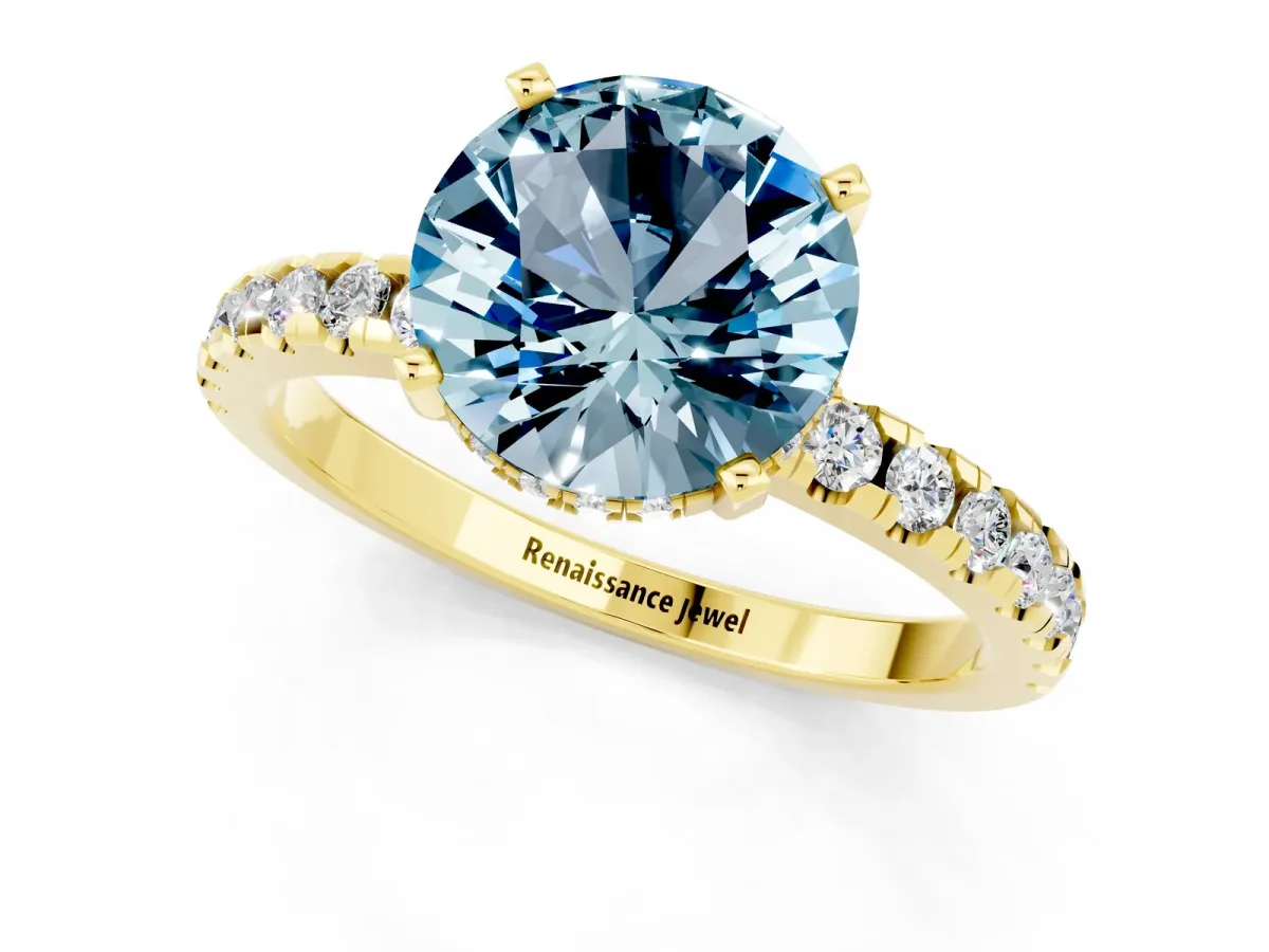 Round Cut Aquamarine Solitaire Ring with Round Pavé Band and Four-Prong Setting Yellow gold