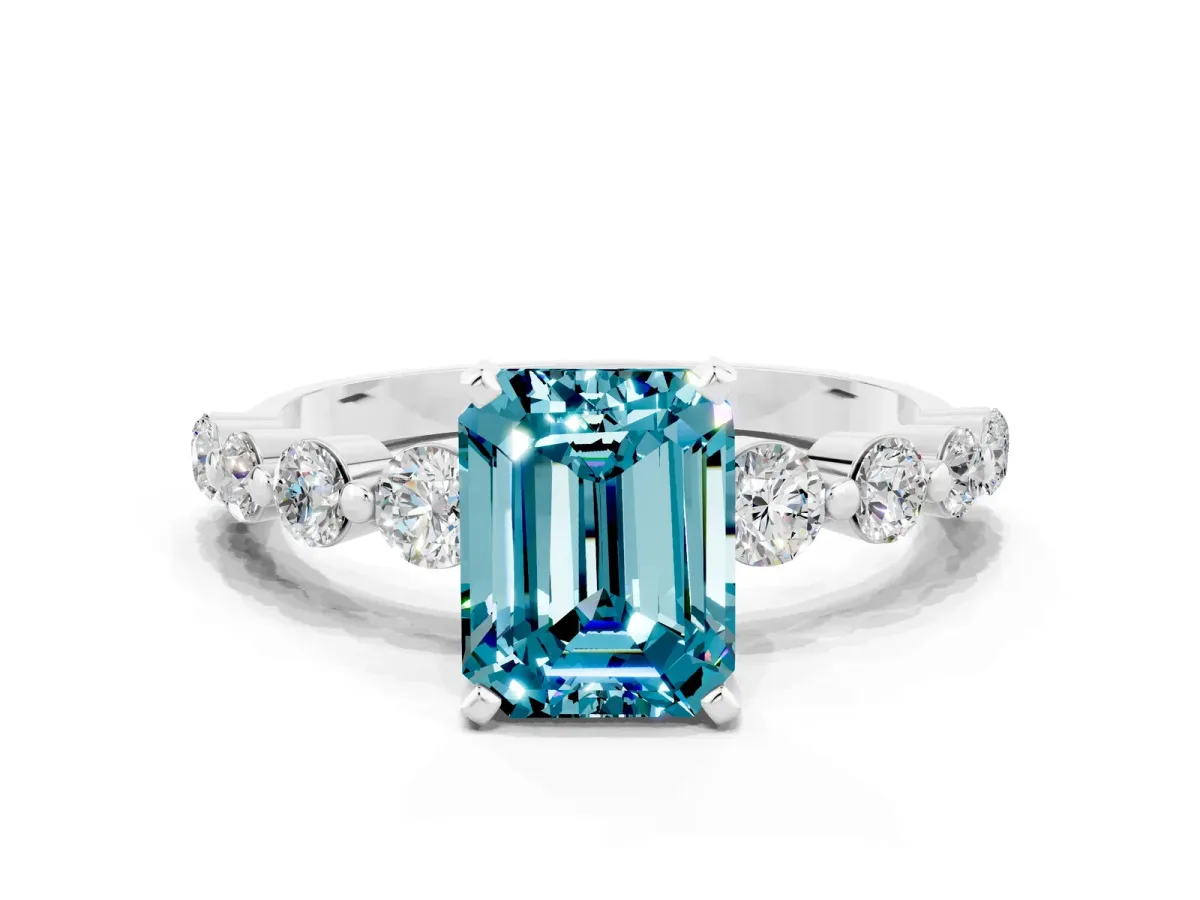 Emerald Cut Solitaire Blue Topaz Ring with Pave Band and Four-Prong Setting Platinum