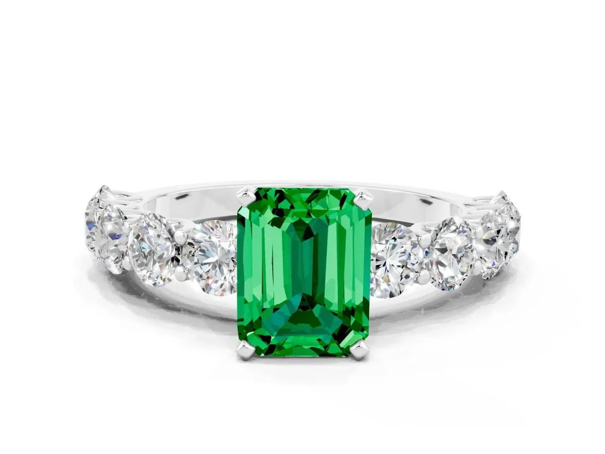 Emerald Cut Emerald Prong Setting with Side Stones on a Pave Band Silver