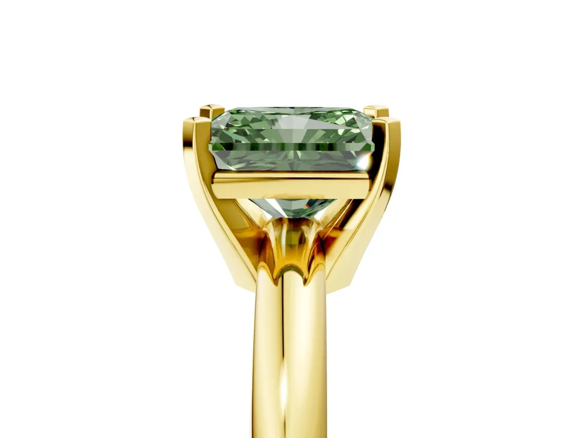 Fancy Green Radiant Cut Diamond Solitaire Engagement Ring with Round Band and Four-Prong Setting Yellow gold