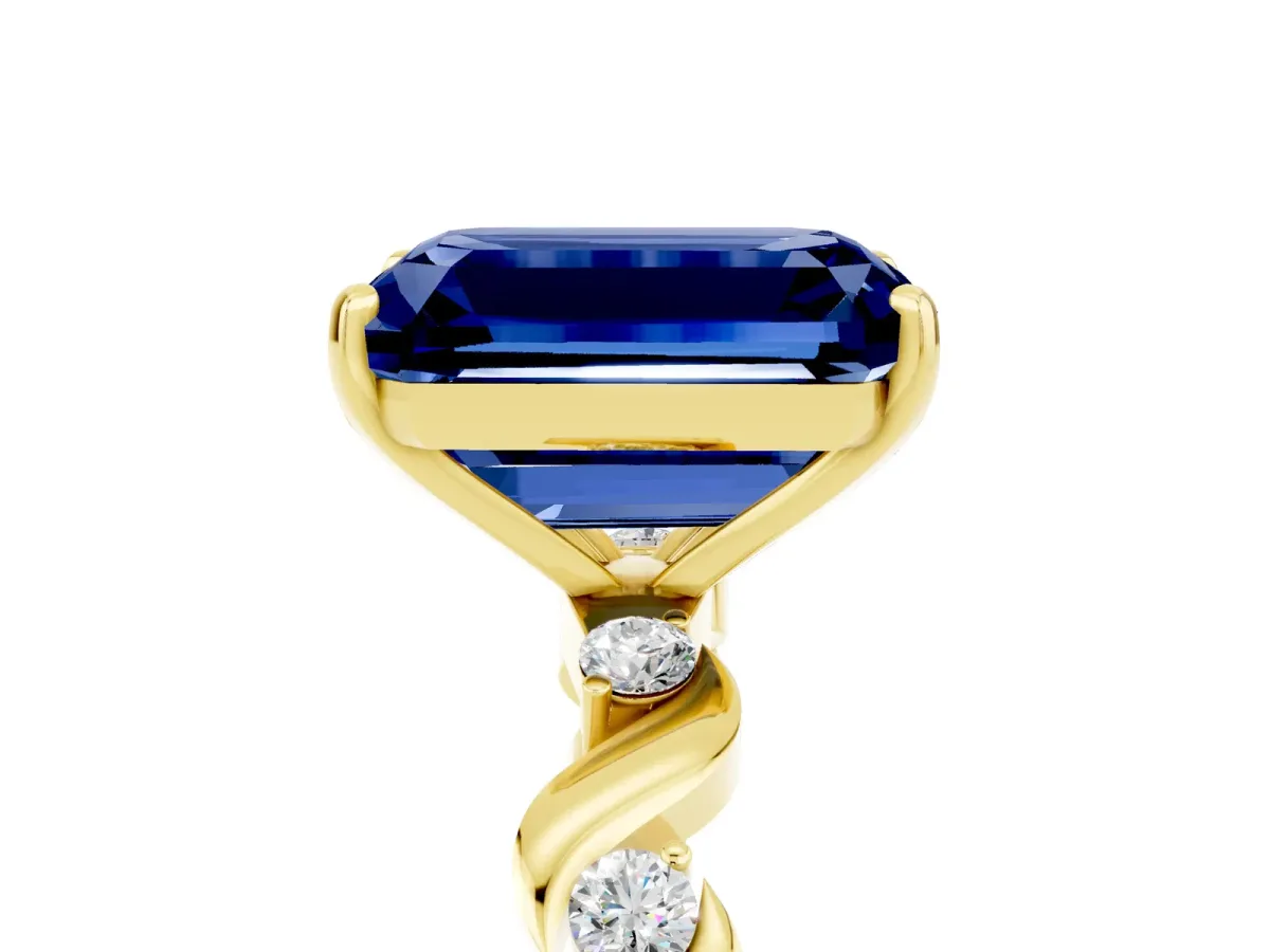 Emerald Cut Blue Sapphire Solitaire Twisted Band with Round Accents and Prong Setting Yellow gold