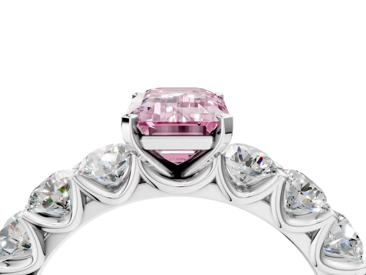Fancy Pink Emerald Cut Diamond Prong Setting with Side Stones on a Pave Band Silver