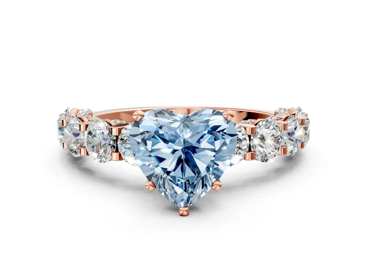 Fancy Blue Heart Cut Diamond Side Stone Engagement Ring with Four-Prong Setting Rose gold