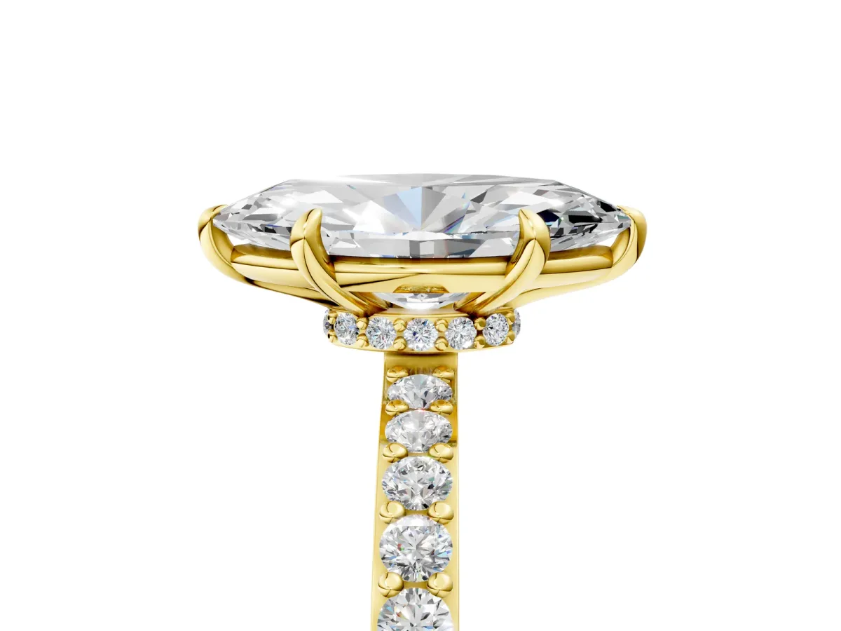 Marquise Cut Diamond Solitaire Engagement Ring with Pavé Band and Four-Prong Setting Yellow gold