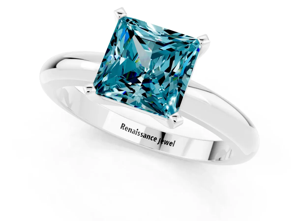 Princess Cut Blue Topaz Solitaire Engagement Ring with Round Band and Four-Prong Setting White gold