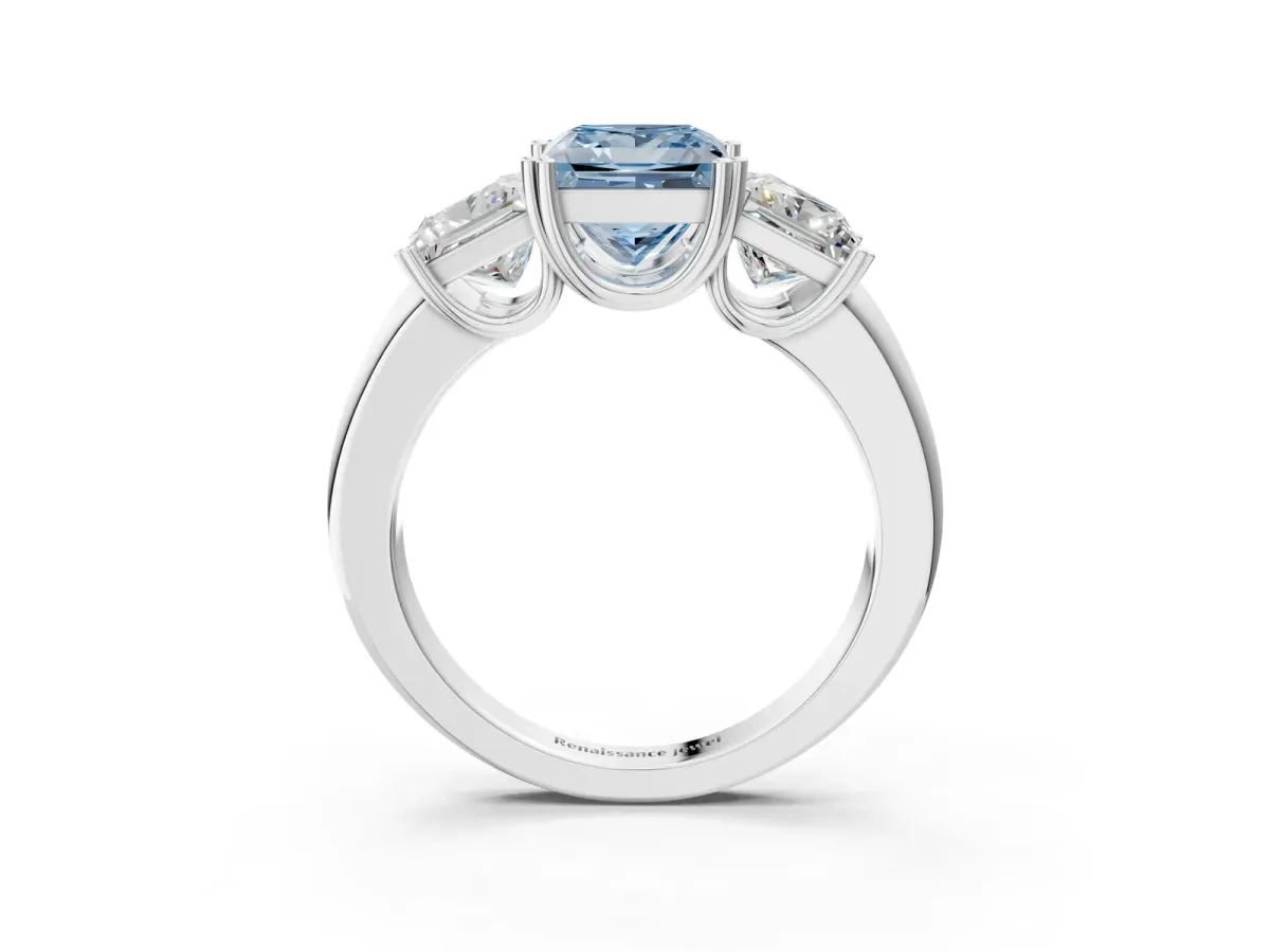 Fancy Blue Three-Stone Princess Cut Cut Diamond Ring with Channel Set Band and Four-Prong Setting Silver