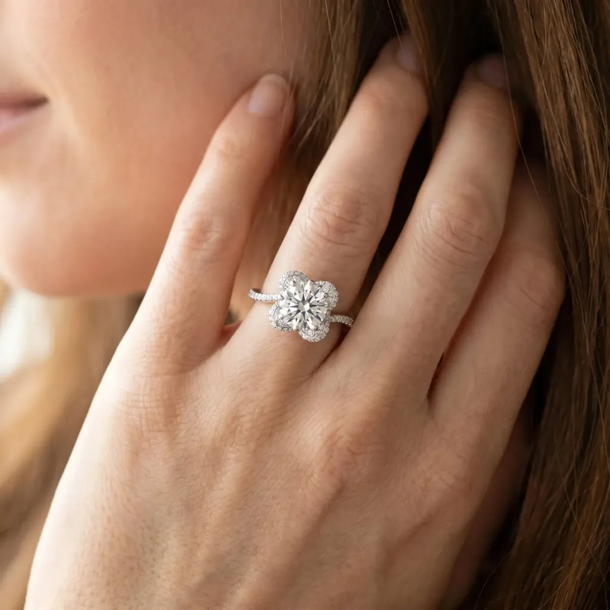 Round Cut Halo Diamond Engagement Ring with Twisted Pave Band and Four-Prong Setting White gold