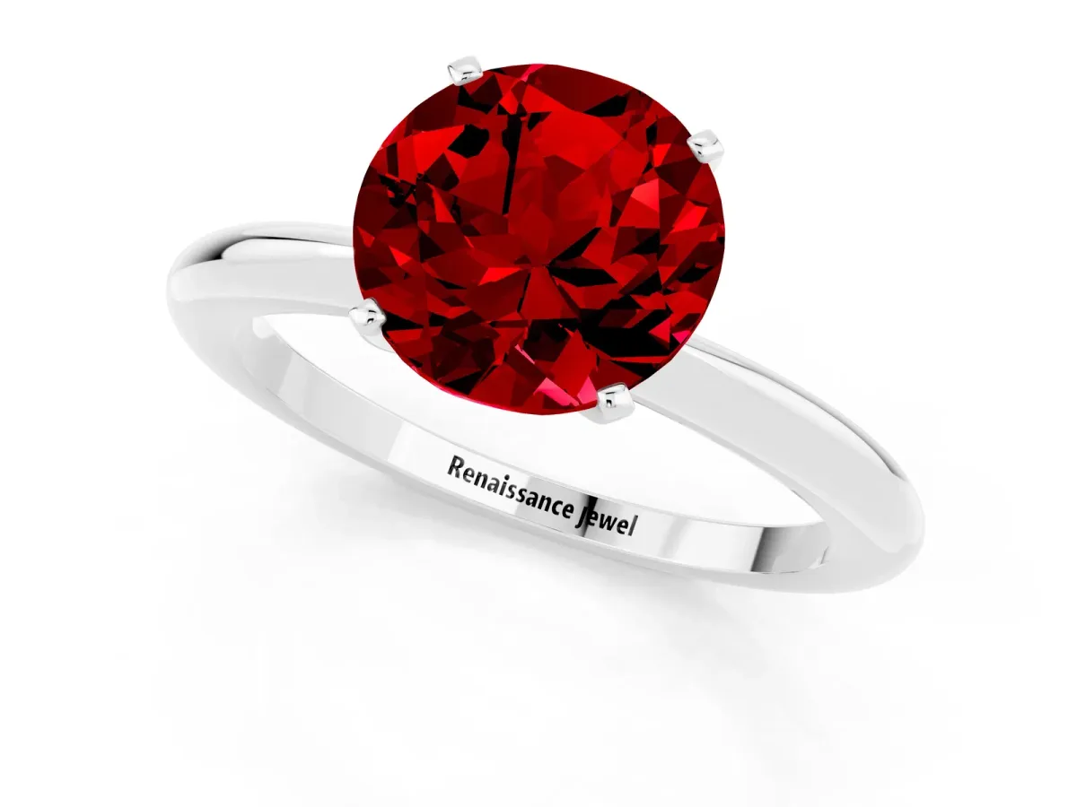 Round Cut Ruby Solitaire Ring with Six-Prong Setting and Classic Band White gold