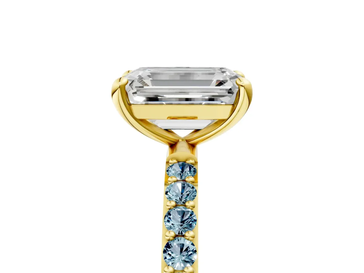Emerald Cut Diamond Solitaire Ring with Round Aquamarine Pavé Band and Prong Setting Yellow gold