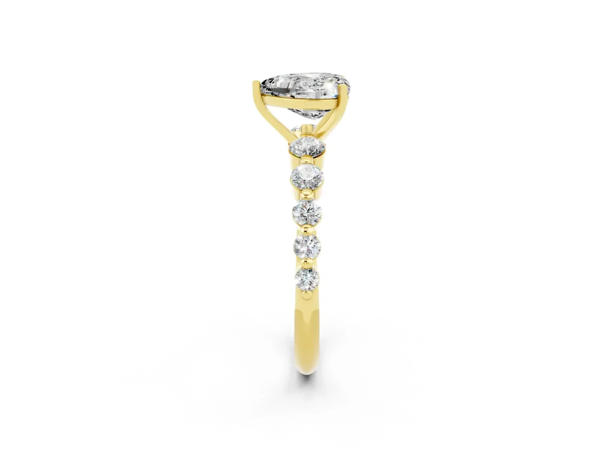 Heart Cut Solitaire Moissanite Ring with Pave Band and Four-Prong Setting Yellow gold