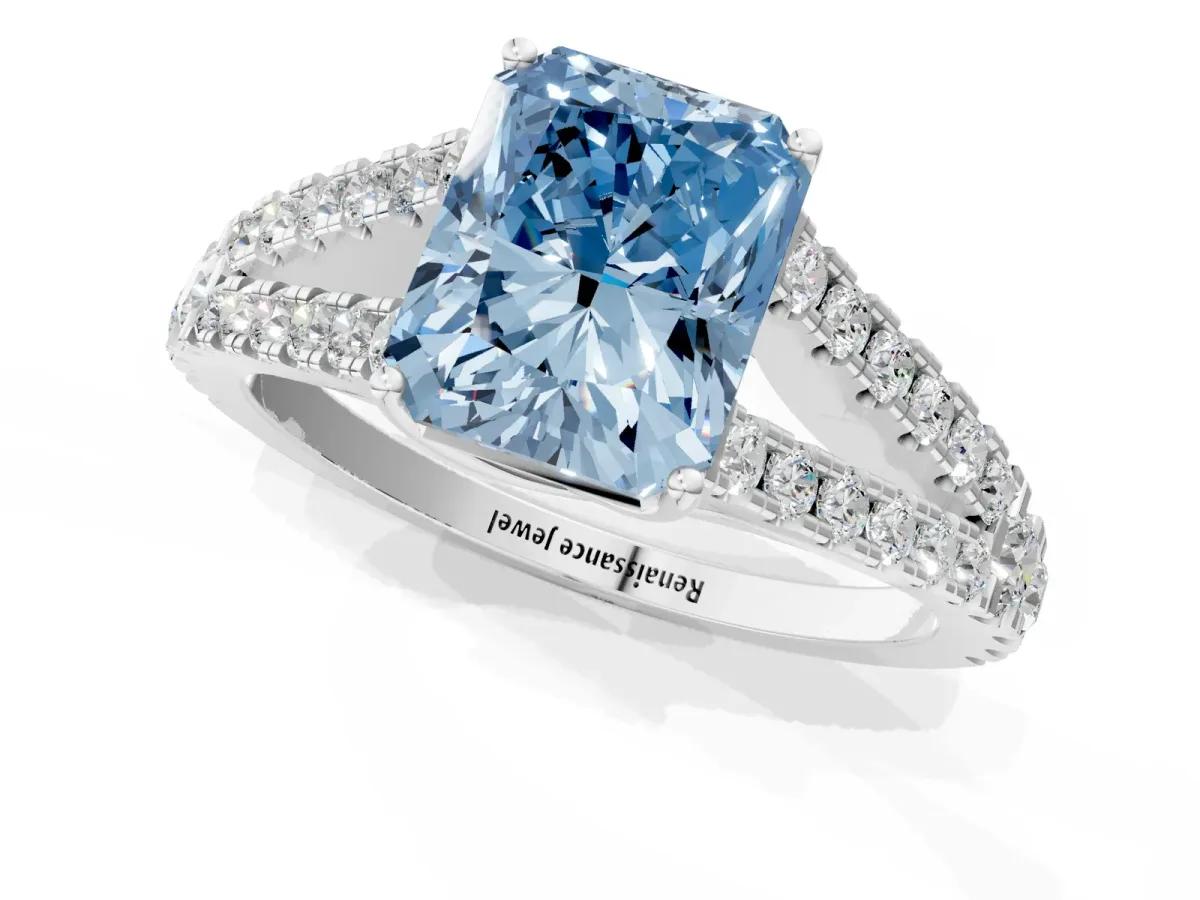Fancy Blue Radiant Cut Diamond Split Shank Pavé Engagement Ring with Four-Prong Setting White gold
