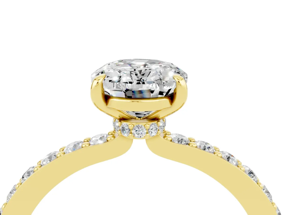 Oval Cut Moissanite Solitaire Engagement Ring with Pavé Band and Four-Prong Setting Yellow gold